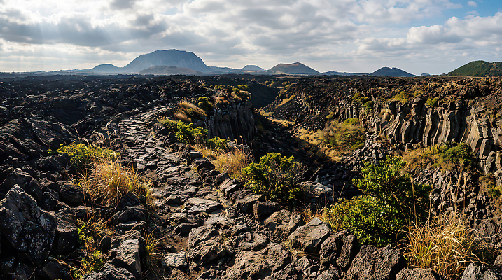 JPG 편집이미지 길 여행 자연 하늘 산 풍경 제주도 탐험 돌_바위 황무지 화산 지형 편집실사 AI포토 AI콘텐츠 한국 CG 생태계 파일형식